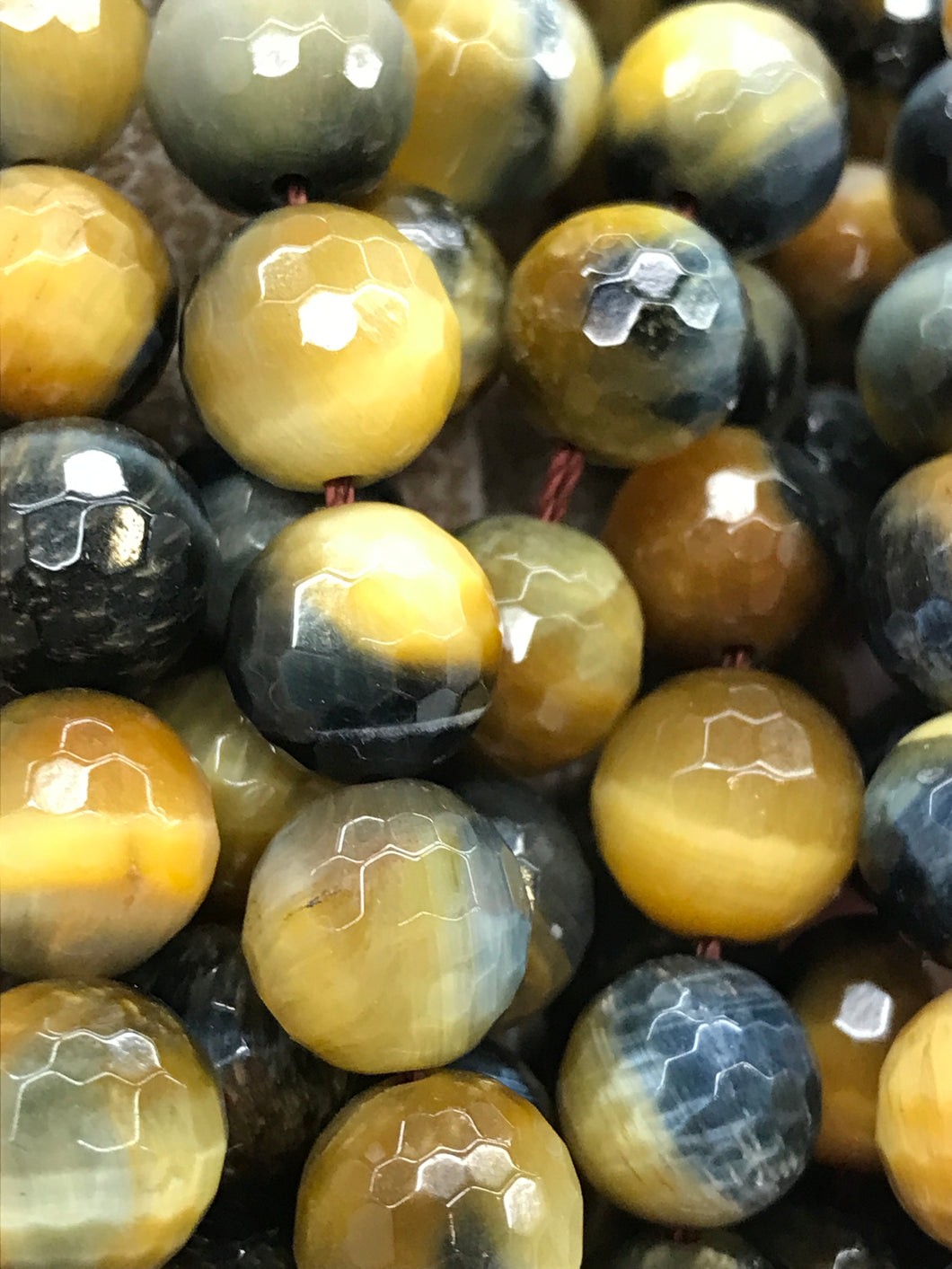 HAWKS EYE 10MM FACETED